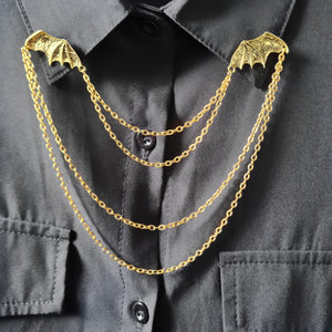 Gold bat wings collar pin