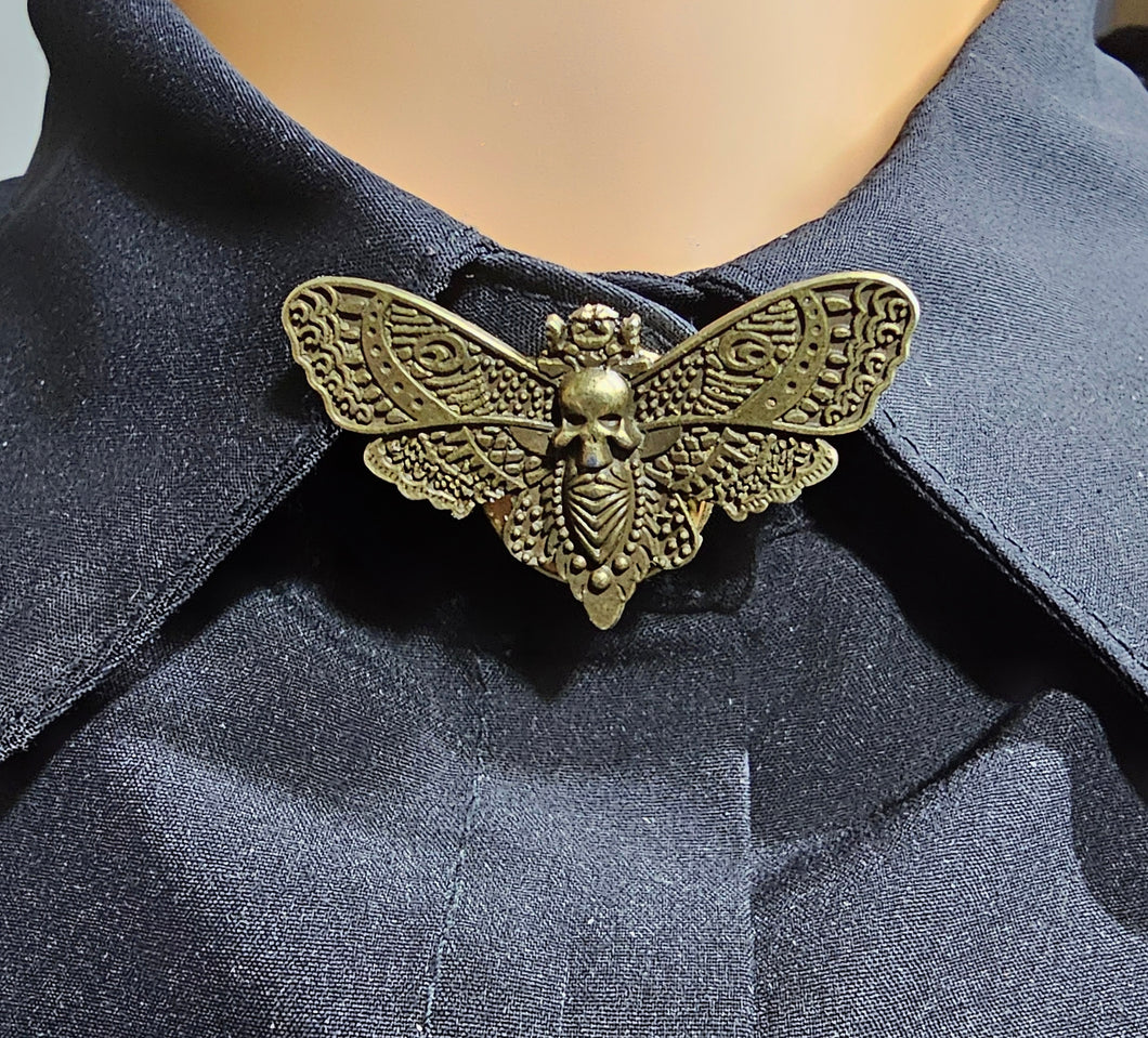 Bronze moth button cover