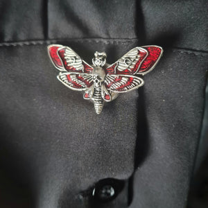 Red moth button cover