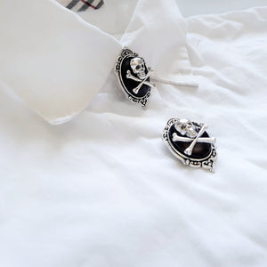 Crossbone skull button cover