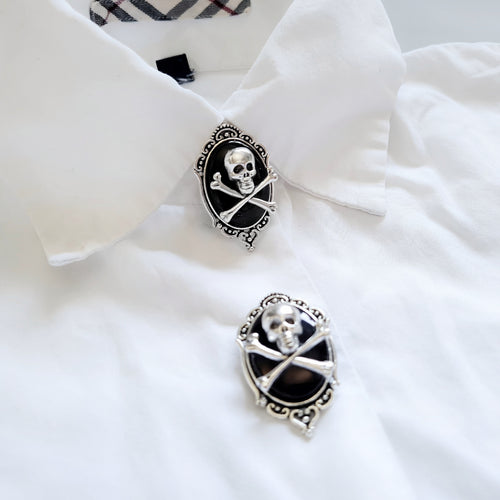 Crossbone skull button cover