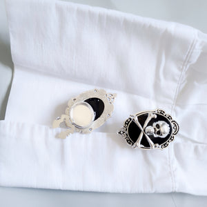 Crossbone skull button cover