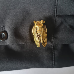 Cicada button cover