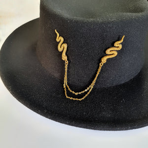 Gold snake collar pin